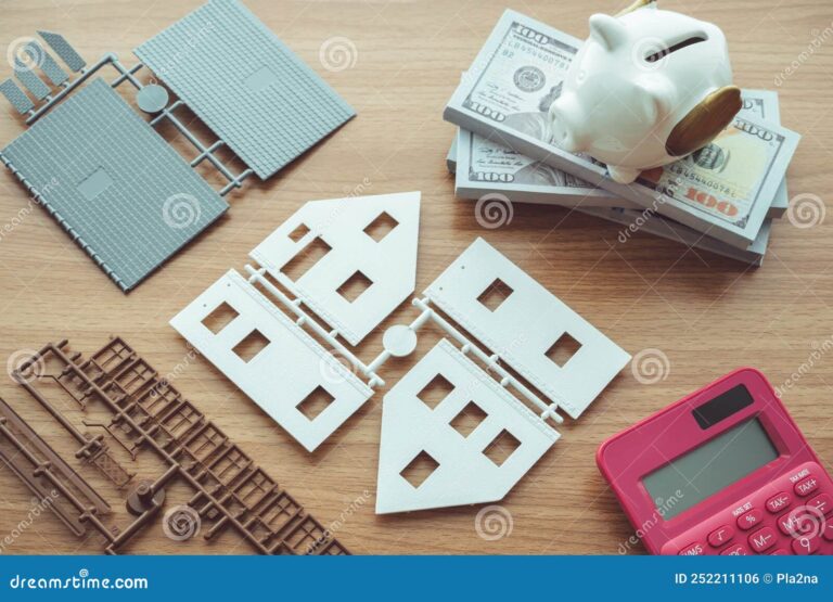 Comment Calculer Sa Capacité d’Emprunt Avec Apport Personnel 2 calculatrice avec maison miniature et pieces