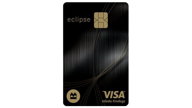 carte visa infinite devant un lounge daeroport luxueux