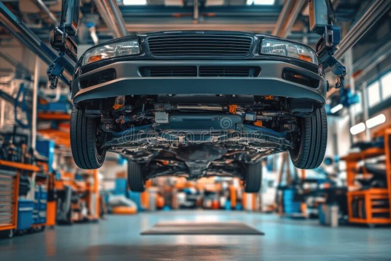 garage automobile avec voiture en inspection