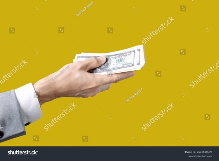 main offrant un billet dargent lumineux